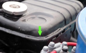 Coolant tank repaired, painted, installed . (click to enlarge)